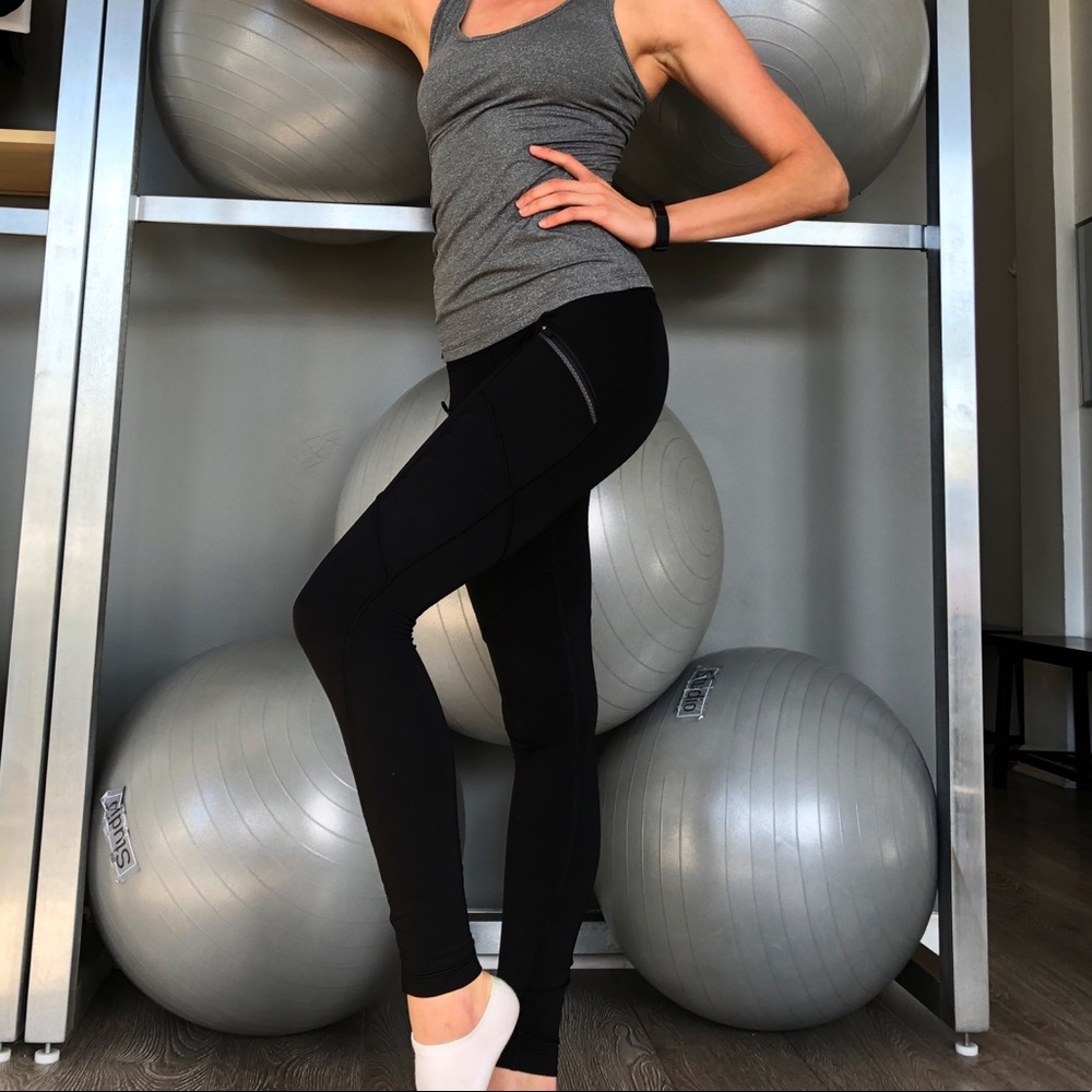 Black lululemon toasty tech tight with zip pockets